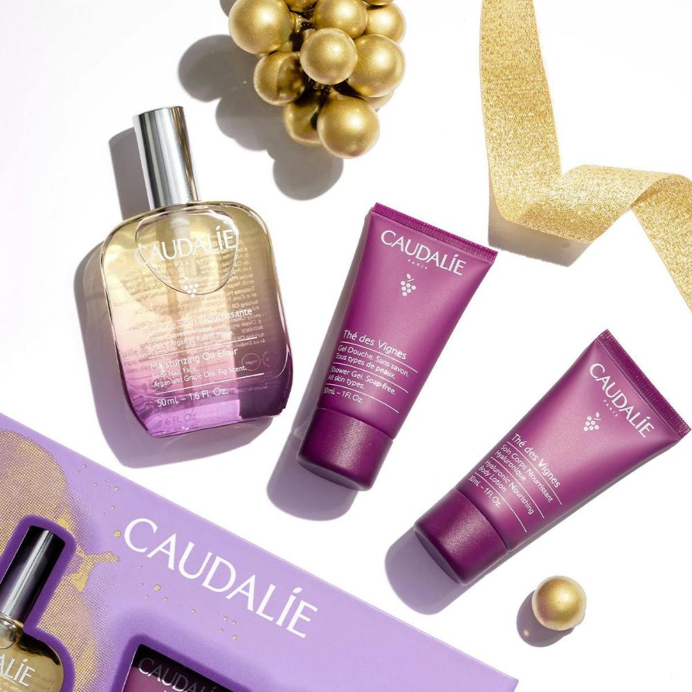 Caudalie Xmas Promo Moisturising Oil Elixir Λάδι Προσώπου, Σώματος & Μαλλιών, 50ml, Δώρο The des Vignes Shower Gel Αφρόλουτρο Σώματος, 30ml & The des Vignes Hyaluronic Nourishing Body Lotion Ενυδατική Λοσιόν Σώματος, 30ml, 1σετ