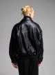 Black double breasted eco leather Jacket with tuxedo lapel and with elasticated hem WLC-8