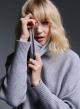 Turtleneck  Knit blouse with fringes in front at the hem - 1